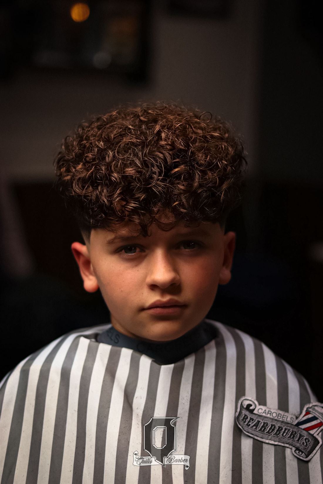 Rizos con degradado en niño